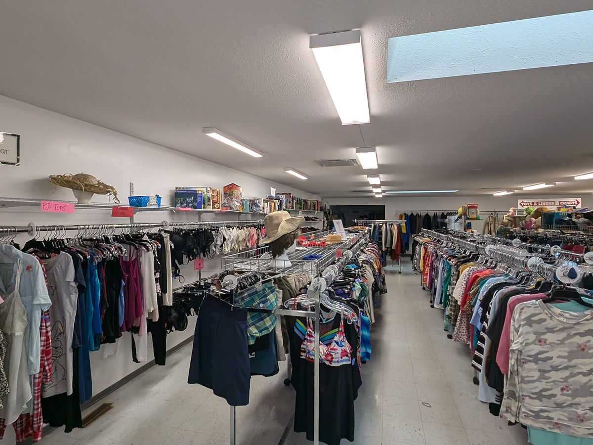 Racks of clothing inside the Gleaners store